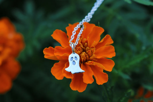ghost on a dainty silver chain