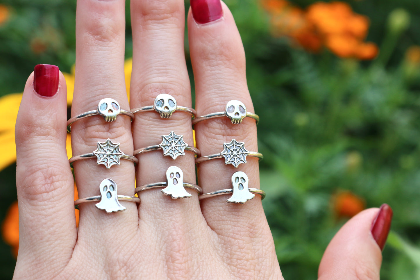 three rows of rings, spider web ring, skull ring and ghost ring