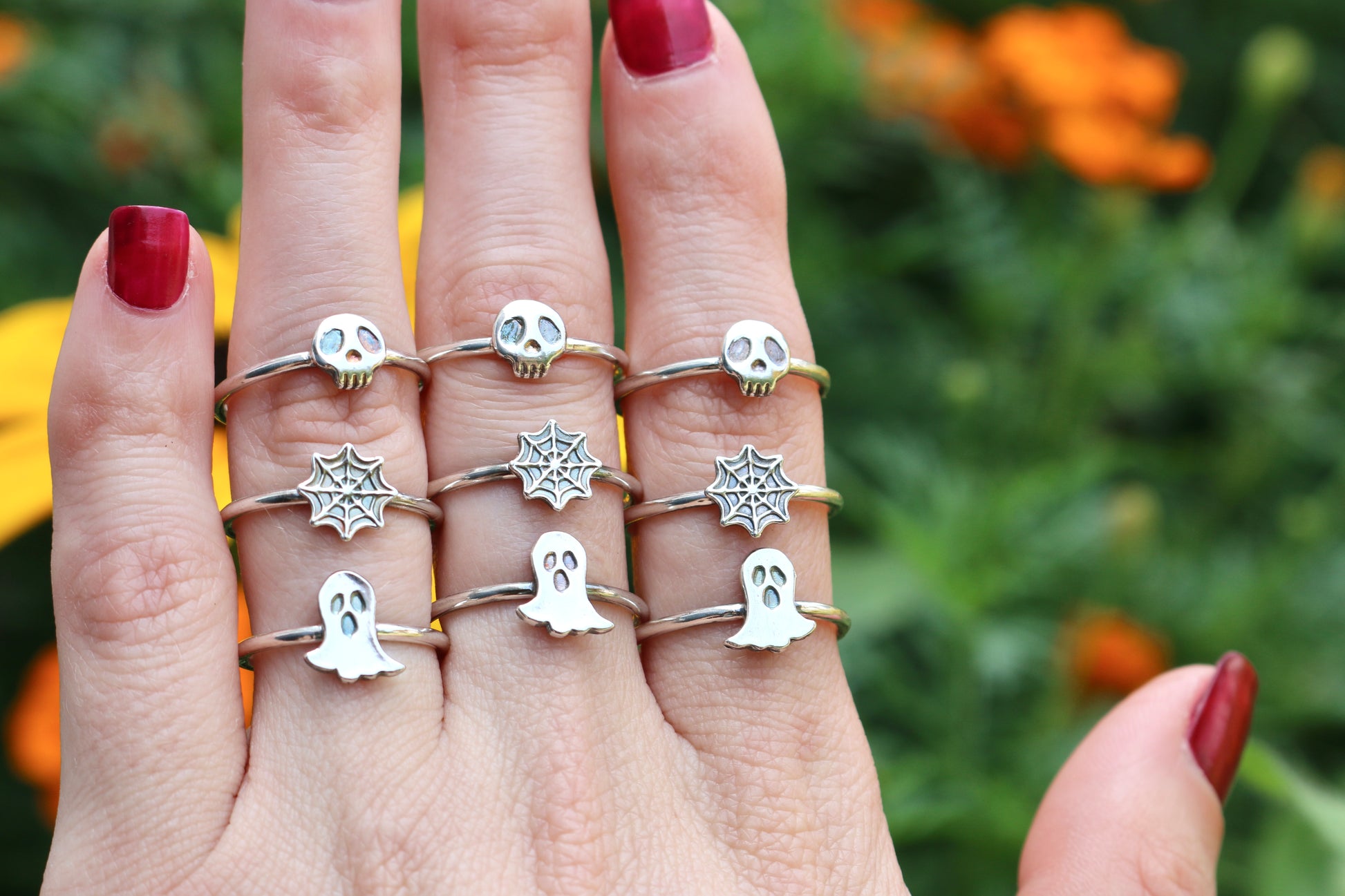 three rows of rings, spider web ring, skull ring and ghost ring